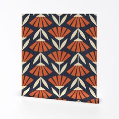 an orange and white pattern on a black background is featured in front of the image