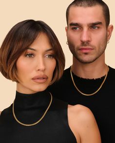 Mark your special moments with our His and Hers Cuban 5mm Chain Set—an ideal gift for celebrating shared milestones. This meticulously crafted duo not only embodies timeless style but also serves as a meaningful symbol of your unique connection. Surprise your loved one with a thoughtful gesture, combining the allure of exquisite detailing with the convenience of a perfectly matched set. JAXXON His and Hers Cuban 5mm Gold Chain Set | 22"/18" Classic Cuban Link Necklace Gift, Tarnish Resistant, Elegant Cuban Link Necklace As A Gift, Modern Cuban Link Necklace With Figaro Chain As Gift, Minimalist Cuban Link Necklace With Box Chain As Gift, Elegant Cuban Link Box Chain Necklace As Gift, Modern Cuban Link Chain Necklace As Gift, Classic Cuban Link Necklace With Curb Chain For Anniversary, Luxury Cuban Link Necklace With Box Chain As Gift, Luxury Cuban Link Box Chain Necklace As Gift