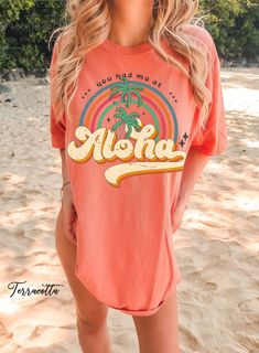 Discover our Sun-Kissed Comfort Color Shirts, the ultimate summer wardrobe essential, designed to enhance your beach vibes and create unforgettable summer memories! Featuring a range of eye-catching designs inspired by sun-soaked beaches, tropical paradise, and endless summer adventures, our shirts will have you daydreaming about your next beach escape. Dive into a world of surf, sand, and salty sea breeze with our vibrant collection of t-shirts that embrace the aloha spirit and coastal living l Pink Palm Tree Print Short Sleeve Top, Tropical Multicolor T-shirt For Vacation, Multicolor Hawaiian T-shirt For Beach Season, Multicolor Tops For Surfing, Beach Season, Multicolor Tops For Surfing Beach Season, Tropical Printed Tops For Surfing, Tropical Printed Tops For Resortwear, Pink Hawaiian T-shirt For Vacation, Pink Hawaiian Short Sleeve T-shirt