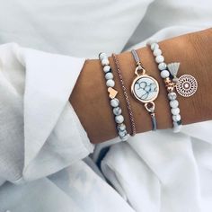 Item Type: Bracelet
 	Material: Zinc Alloy, Stone
 	Gender: Women
 	Length: 16-18.5 cm / 6.30-7.28 inch

Package Includes:

 	4 x Pcs Hand Hart, Boho Charm Bracelet, Lacey Chabert, Geometric Bracelet, Bohemian Handmade, Tassel Bracelet, Bohemian Bracelets, Metal Heart, Styl Boho