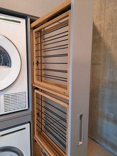 a washer and dryer in a room next to each other