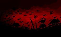 birds are flying in the dark red sky