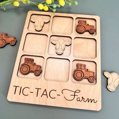 a wooden puzzle with farm animals and tractors