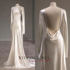 the back of a wedding dress with long sleeves and an open back, on display