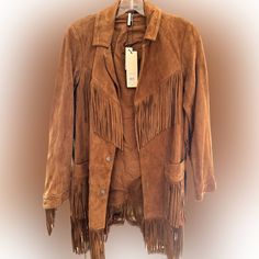 Fringe Suede Boho Style Jacket With 2 Snaps Front And Matching Waist Belt. Fringe At Sleeves, Pockets, Yoke And Bottom. Notch Lapel. Winter Festival Long Sleeve Leather Jacket, Long Sleeve Leather Jacket For Fall Festivals, Fall Festival Long Sleeve Leather Jacket, Fall Festival Leather Jacket, Bohemian Long Sleeve Leather Jacket For Fall, Bohemian Long-sleeve Leather Jacket For Fall, Chic Fitted Outerwear For Festivals, Chic Fitted Festival Outerwear, Topshop Jacket