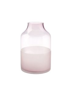 a pink glass vase sitting on top of a white table