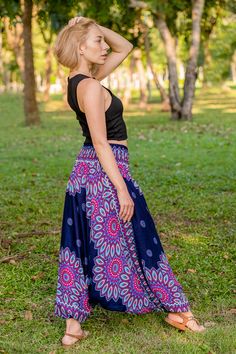 Part of our harem pants range, these blue Lotus pants are baggy sarouel style pants which double as a jumpsuit. In short, they’re at once stylish, versatile and practical. 
 
Pattern 
Inspired by the iconic lotus flower, a Thai spiritual symbol, these pants are adorned with petals on the waist and the lower legs. A bold print on a solid color are what makes them so dazzling. 
 
100% Vegan & Fairtrade 
Made from vegan-friendly Thai bamboo, these rayon pants are super soft and kind on the environm Harem Pants Diy, Fisherman Pants, Lotus Print, Hippie Pants, Blue Lotus, Rayon Pants, Style Pants, Bold Prints, Vegan Friendly