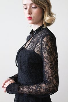 "Vintage 1950s - 60s black lace dress with matching long sleeved jacket. Dress has spaghetti straps and zipper at the side. The matching jacket has black sequins around the collar and long sleeves that come to a point. Both the dress and jacket are in excellent condition. Dress was pinned to fit model. Measurements Dress Straps: 16.25\" / Bust: 33.5'' / Waist: 27.25'' / Hip: free / Skirt Length Waist to Hem: 34.25\" / Length Shoulder to Hem: 50'' Jacket Shoulders: 17\" / Sleeves: 27\" / Underarm Black Lace Party Dress, Lace Party Dress, Dress Straps, Lace Party Dresses, Dress And Jacket, Long Sleeve Jacket, Black Lace Dress, Long Sleeves Jacket, Strap Dress