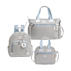 three pieces of grey and blue purses