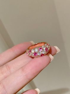 This charming ruby ring, with its sweet macaron-inspired colors, combines vintage polka dots with a fresh, vibrant twist. The ring features a mix of diamonds set in a staggered pattern for a layered look and a heart-shaped lattice design underneath. Handcrafted from 925 sterling silver with a thick rose gold plating, it shines beautifully and adds a playful elegance to any outfit. Metal: 18K Recycled Gold Plated Vermeil on Recycled Sterling Silver Gemstone: Cubic Zirconia/Ruby Red/Paraiba Blue Ring Sizes Available: 5, 6, 7, 8(US) Sliver Earrings, Blue Ring, Lattice Design, Ring With Diamond, Tiger Eye Stone, Enamel Earrings, Ring Sizes, Recycled Gold, Ruby Ring