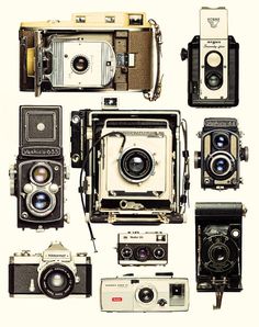 an assortment of old cameras with different styles and sizes, all showing the same lens size