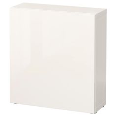 a white refrigerator freezer sitting on top of a counter