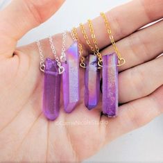 Purple Aura Quartz Raw Crystal Necklace / Fairy Kei / Lavender Quartz Point Necklace Pendant / Amethyst Crystal / Pastel Goth NecklaceThese necklaces are handmade with beautiful purple aura quartz crystals and tarnish-resistant silver, antique copper, or gold jewelry wire and 2mm cable chain. Each quartz crystal pendant is handmade and unique, with varying shimmer and size, but maintains the same simple wire wrap design. This design is inspired by witches, pastel goth and fairy kei fashions, mag Purple Aura Quartz, Necklace Fairy, Purple Aura, Handmade Crystal Necklace, Pastel Kawaii, Goth Necklace, Lavender Quartz, Handmade Crystal Jewelry, Pastel Grunge