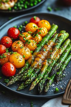 Grilled asparagus topped with seasoning, served with vibrant cherry tomatoes on a black plate. Asparagus Dishes Dinners, Asparagus Recipes For Thanksgiving, Asparagus Grilled, Asparagus Balsamic, Simple Sides, Asparagus Dishes, Creamy Asparagus, Asparagus And Mushrooms