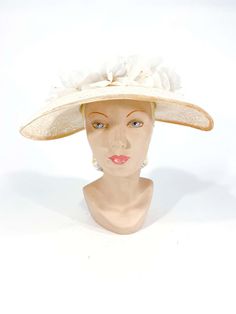 For Sale on 1stDibs - 1950s cream-colored starched lace picture hat with handmade french silk flowers, velvet trim, and bow accent. This hat is meant to be worn with a hat pin French Silk, Velvet Trim, Hat Pin, Cream Lace, Hat Pins, Silk Flowers, Meant To Be, Velvet, Trim