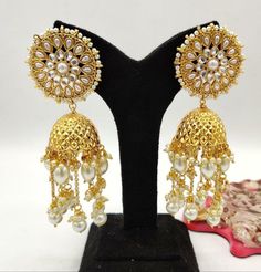 Bridal Kundan Jhumka/Kundan Earring/Bollywood Jewelry/Kundan pearl beads Jhumka/SabyaSachi Indian Jadau wedding Earring/ Pakistani Earrings Beautiful high quality Traditional Indian Wedding earrings with Kundan, Stones, Meena and Pearls/beads work. Very beautiful and attractive, These sophisticated glittering earrings have high-end kundan stones in Meena setting. Features - Traditional Kundan/Polki/Meenakari earrings pair - Handcrafted To Perfection - Unique boutique design - Perfect for Indian Luxury Round Kundan Jhumkas, Luxury Traditional Kundan Jhumkas, Celebration Dual-tone Kundan Jhumkas, Bohemian Kundan Jhumkas, Ornate Kundan Jhumkas, Indian Wedding Earrings, Kundan Jhumka, Meenakari Earrings, Earrings Kundan