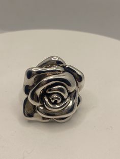 Vintage rose Sterling silver Size 8 can be sized by my jeweler. His service charge is $10-$20 Oxidized from age All rings are shipped free in the US in a nice gift box. Check out our over a THOUSAND great reviews!!! Engraving is $4 per letter and is not always perfect depending on the piece. It can take a few days if the jeweler is busy. This is payable to Paypal Judithsltd@gmail.com Elegant Silver Flower Ring For Valentine's Day, Silver Round Flower Ring For Valentine's Day, Silver Flower Ring For Valentine's Day, Elegant Silver Rings With Rose Design, Elegant Silver Rings With Rose Details, Rose Sterling Silver Anniversary Ring, Rose Sterling Silver Ring For Anniversary, Elegant Rose Sterling Silver Flower Ring, Elegant Rose Flower Ring In Sterling Silver