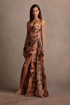 Exude confidence in our Aurra Maxi Dress. This floral chiffon style features a pleated neckline, paired with exposed boning at the waist and a draped floor-length skirt. This is the perfect go-to dress for your next formal event. Fig Bridesmaid Dresses, Asian Wedding Guest Dress, Victorian Wedding Guest Dress, Ethiopian Wedding Guest Attire, Florence Wedding Guest Dress, Romantic Evening Dress, New Mexico Wedding Guest Dress, Eucalyptus Wedding Guest Dress, High Low Evening Dresses Elegant