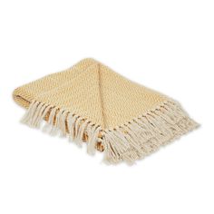 a yellow and white throw with fringes on it's ends, sitting on a white surface