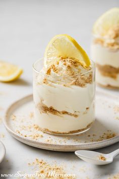 two small desserts with lemon slices on top