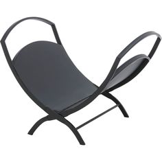 a black chair sitting on top of a metal frame with an armrest and foot rest