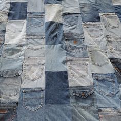 an old patchwork denim blanket with several different colors and sizes on the bottom half