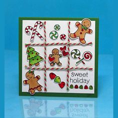 a handmade christmas card with ginger cookies and candy canes on the side,