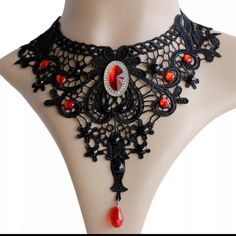 This Is An Exquisite Hand Made Goth Fabric Lace And Metal Alloy With Red And Black Stone Detail Adjustable Bib Choker Necklace! Chosen As Host Pick For The Best In Boutiques Posh Party 1/16/2024! Chosen As Host Pick For The Trendy Treasures Posh Party 5/9/2024!! Chosen As Host Pick For The Sizzling Style Posh Party 6/28/2024!! Punk Red Necklace For Halloween, Black Vampire Style Necklace For Party, Black Vampire Style Necklaces For Party, Black Vampire Necklace For Party, Red Choker For Halloween Party, Gothic Necklaces For Halloween, Red Punk Choker For Festivals, Red Gothic Choker For Festivals, Vampire Style Halloween Necklace