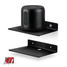 two black speakers sitting on top of each other in front of a white background with the same speaker attached to it