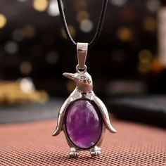 Amethyst Natural Stone Penguin Shaped Pendant Necklace Healing Gemstone Pendant Size: 4.1cm X 2.4cm Stock Id: Tja79-08-Z135 Silver Pendant Crystal Necklace With Lobster Clasp, Silver Amethyst Birthstone Crystal Necklace, Silver Amethyst Gemstones For Jewelry Making, Silver Amethyst Birthstone Necklace, Silver Amethyst Round Pendant Crystal Necklaces, Silver Amethyst Pendant Crystal Necklace, Purple Metal Crystal Necklaces As Gift, Purple Metal Crystal Necklaces For Gifts, Silver Crystal Necklaces With Round Stones