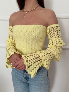 100% handmade crochet top with lovely long sleeves.  YARN: 100% cotton yarn SIZE: XS-S arm circumference 23-27cm (stretchy sleeves) Bust circumference 70-85 Waist circumference 62-75 M arm circumference 25-30cm (stretchy sleeves) Bust circumference 80-95 Waist circumference 72-85 MEASUREMENTS: Before buying, measure your bust, waist and arm circumference to make sure that the chosen size fits you. Lenght of top: ~23,5cm Lenght of sleeve: ~51,5cm  Sleeves have a sewn-in elastic band Fitted Long Sleeve Crochet Top For Spring, Bohemian Fitted Long Sleeve Crochet Top, Fitted Long Sleeve Crochet Top With Crochet Trim, Fitted Long Sleeve Crochet Top With Trim, Fitted Long Sleeve Crochet Top For Summer, Spring Crochet Lace Long Sleeve Sweater, Long Sleeve Crochet Trim Summer Top, Fitted Crochet Lace Summer Sweater, Hand Knitted Long Sleeve Crochet Top For Spring