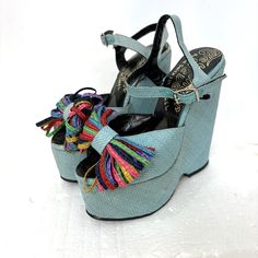 The Wonder Wedge Bonnie Smith For Kimel Platform Heels Vintage 1970s Collectible Iconic Vintage 1970s Original Platforms Kimel Wonder Wedge Vintage 70s Disco Era Huge Platforms Fabric Covered Sculptured Platform Sandals Platform & Adjustable Ankle Straps Covered In Aqua Color Woven Fabric Mega High Platform Sandals Wedge Peeptoes With Colorful Raffia Bows On Vamp High End Handmade Works Of Art Overall Condition Is Very Good With Some Imperfections No Rips Or Tears Light Smudge Wear See Photos Bo Vintage High Heel Wedge Sandals For Spring, Vintage Summer Wedge Sandals With Platform, Spring Vintage High Heel Wedge Sandals, Vintage Summer Platform Heels, Retro Platform Wedge Sandals With Round Toe, Retro Round Toe Platform Wedge Sandals, Vintage Wedge Heel Sandals For Spring, Vintage Wedge Sandals For Spring, Retro Wedge Heels For Party