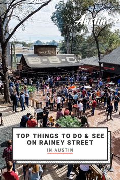 Once a sleepy residential area, the Rainey Street district has become an entertainment hot spot of bungalows-turned-bars, high-end hotels and live music venues in a tucked-away corner of Downtown Austin. Find out where to go and what to do on this street that never sleeps. Image shows large crowd dancing and enjoying the patio at Banger's Sausage House and Beer Garden. Here you can choose from over 200 beers on draft to go with a juicy sausage or plate of whole hog barbecue. Rainey Street Austin, Historic Bungalow, Downtown Austin Texas