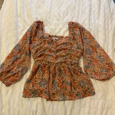 American Eagle Baby Doll Blouse Never Worn Size Small. Pretty Pink And Coral Colored Cute Multicolor Long Sleeve Blouse, Spring Multicolor Square Neck Tops, Multicolor Square Neck Tops For Spring, Cute Long Sleeve Floral Print Tops, Cute Long Sleeve Orange Top, Cute Fall Blouse For Brunch, Fitted Multicolor Square Neck Tops, Cute Long Sleeve Blouse With Floral Print, Cute Long Sleeve Red Blouse