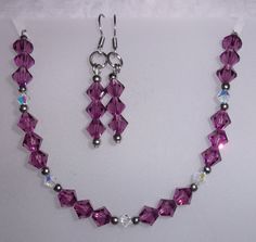 "Swarovski's Amethyst crystal bracelet and earring set! The 6mm crystals are set with 4mm aurora crystals and 3mm beads to make a beautifully patterned bracelet set. The bracelet is 7\" long with a 1\" extension chain that can be adjusted link by link, and the earrings are 1.75\" long with a 1\" drop. The beads, clasp, chain and ear wires are all stainless steel-hypoallergenic, durable and tarnish resistant. From every day to a wedding, this amethyst crystal set will be the perfect accent!" 3mm Bead Necklace, Diy Necklace Patterns, Amethyst Crystal Bracelet, Diy Jewelry Set, Bracelet And Earring Set, Diy Jewelry Unique, Jewelry Set Design, Sparkly Jewelry, Swarovski Crystal Necklace