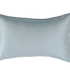 a light blue pillow on a white background