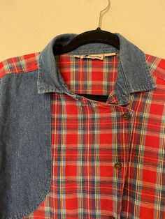 Vintage flannel, plaid, asymmetrical button down shirt. Brand: Gotcha Covered, made in USA  Condition: this shirt is is good condition, second hand, no stains or tears.  Vintage items are often pre-owned. I do my best to report condition accurately, if you feel as though I have misrepresented an item please contact me immediately. I will do what I can to work with you and figure out how to remedy any grievances.  House Savvy is not responsible for lost or stolen packages, but I will do my best to ensure your package reaches you safely. I will ship through USPS/mail carrier, and all packages are insured through them. Please make sure that all addresses on your order or correct. I will not be able to make accommodations for packages delivered to wrong address due to incorrect address upon or Vintage Plaid Flannel Shirt For Spring, Plaid Flannel Shirt For Spring, Spring Plaid Flannel Shirt With Buttons, Spring Plaid Flannel Shirt, Plaid Patchwork Flannel Shirt For Fall, Plaid Collared Flannel Shirt, Plaid Flannel Shirt With Button Closure, Patchwork Long Sleeve Flannel Shirt, Vintage Plaid Flannel Shirt With Pockets