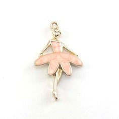 Pink ballerina dancer enamel jewelry pendant charms. Shiny gold colour with pink enamel coating on one side. You can use these jewelry making charms on a chain, multiple strands of beading wire, leather cord, and more. Perfect for wine charms, necklaces, key chains, and other crafting projects. Made out of Alloy , Enamel Gold, Pink colour Dimensions about 30x18mm Quantity 8 pieces We sell crafting supplies in larger bulk quantities. If you want smaller amounts of each, you are welcome to pick an Pink Enamel Charms Jewelry, Pink Enamel Jewelry With Charms, Pink Enamel Charm Necklace, Pink Enamel Charms Necklace, Pink Enamel Necklaces With Charms, Dancer Ballet, Charms For Jewelry Making, Pink Ballerina, Charms Bracelet