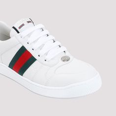 These kicks are the epitome of laid-back luxury, blending classic Italian craftsmanship with a playful pop of color. They're the kind of sneakers you can dress up or down without missing a beat. Trust us, your feet will thank you. Premium white leather with iconic green and red web Embossed GG leather insert for that signature touch Enameled oval metal detail with Double G Gucci logo on the tongue and back Durable rubber sole Made in Italy Season: FW24 100% Leather composition | Gucci Women's Sc Red Web, White Leather Sneakers, Buy Gucci, Leather Cap, Logo Pattern, Mens Gloves, Green And Red, Beach Tote Bags, Sneaker Heels