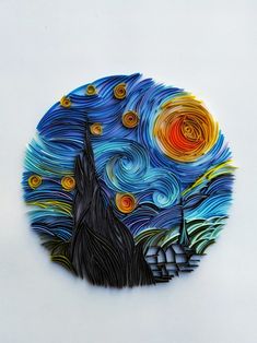 a paper plate with an artistic painting on it