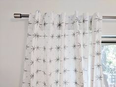 a curtain with black and white stars on it