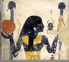 an egyptian painting with the caption'you may so black she look like net, the creator of the universe energy