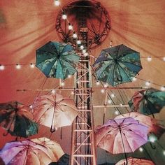 there are many umbrellas that have been lit up