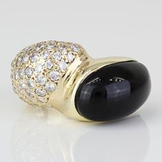 Unique Vintage 14k Yellow Gold Onyx & Diamond Cocktail Ring This Ring Is Made Of 14 Karat Yellow Gold & Displays A Large Onyx Stone Set Right Beside Multiple Diamonds Which Total 1 Carat. The Diamonds And The Onyx Stones Are Both Place In A Unique Setting That Fits The Overall Band Design. The Band Is A Size 4.75, But Can Be Resized By Any Qualified Jeweler. "14k" Is Stamped Onto The Inside Part Of The Band. Size: 4.75 (Resizable) // 4.3 - 8mm Band Width Metal: 14 Karat Yellow Gold Weight: 7.10dwt // 11.04 Grams Stones: 1 Onyx Gemstone + Round-Cut Diamonds (1.00 Carat Total) Nid * E-358 Payment Receipt, Diamond Cocktail Ring, Band Design, Diamond Cocktail Rings, Onyx Gemstone, Onyx Stone, Cocktail Ring, 1 Carat, Round Cut Diamond