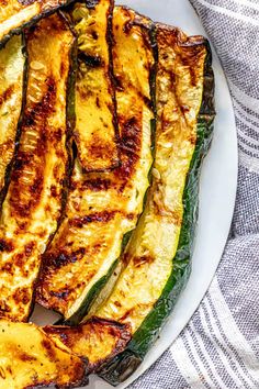 grilled zucchini on a white plate