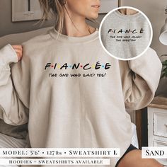 Congratulations!! Celebrate the newly engaged future Mrs with this unique and cozy Fiancee Sweatshirt! This sweater makes the perfect engagement gift for her, and the Bride to be will LOVE it. Give this to the future Bride, or gift this to her and her new Fiance so they can have matching couple's sweatshirts! ** PLEASE READ DESCRIPTION ** All sizes are UNISEX - check Size Chart in Listing Photos        *Need a larger size? Send us a message! ✅ PRODUCTION > Most products are printed to order, so please allow 1-5 business days for production plus shipping time. ⏰ *These times may be extended during busy holiday months - check shop Home Page for updates. > PRINTING : We use an Eco-friendly, Direct-to-Garment (DTG) printing method which means that the design is printed INTO the product. This c Engaged Gifts For Best Friend, Fiance Shirts For Her, Engagement Tshirts Just Engaged, I Said Yes Sweatshirt, Etsy Pod, Fiancee Sweatshirt, Fiancee Shirt, Wedding Vinyl, Wedding Sweater