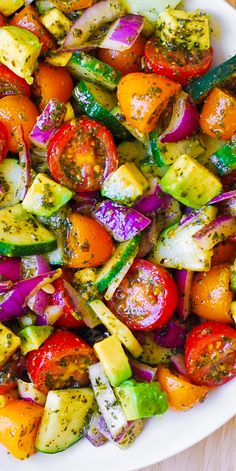 a white plate topped with lots of veggies