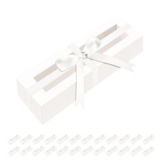 an open white box with a ribbon tied around it and eight smaller ones in the background