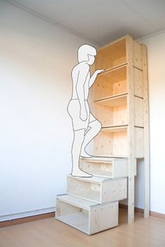 an advertisement for storage with built - in stairs, featuring a man climbing up the stairs