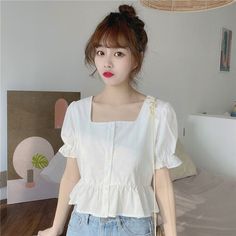 SPECIFICATIONSStyle: korean styleStyle: CasualSleeve Style: RegularSleeve Length(cm): ShortSize: one sizeSeason: SummerSeason: spring summerPattern Type: SolidOrigin: CN(Origin)Model number: blouses shirtsModel Number: qw014Material: CottonMaterial: polyesterFeature 3: casualFeature 2: all-matchFeature 1: chicFabric Type: WovenDepartment name: adultDecoration: RUFFLESCondition: dailyColor: white pink yellowCollar: Square CollarClothing Length: ShortBrand Name: BONNTEEAge: Ages 18-35 Years Old White Cropped Shirt Outfit, Cropped Shirt Outfit, Blouses Short Sleeve, Blouse Korean Style, Korean Blouse, Outfit Korean Style, Girls Korean, Fashion Top Outfits, Sleeves Designs For Dresses